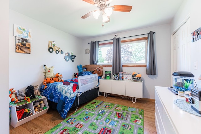 854 Meadow Ln, Sycamore, IL 60178 - bedroom with light wood-type flooring and a ceiling fan