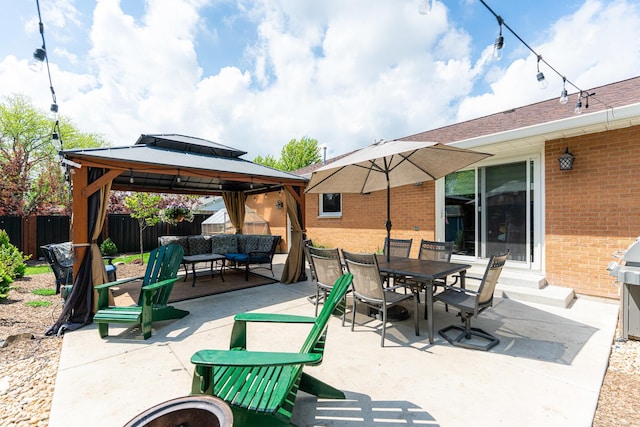 854 Meadow Ln, Sycamore, IL 60178 - view of patio with an outdoor living space, a gazebo, fence, and outdoor dining space