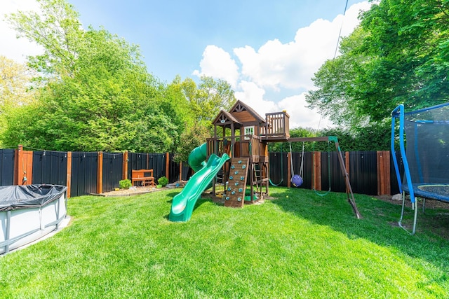 854 Meadow Ln, Sycamore, IL 60178 - view of play area with a trampoline