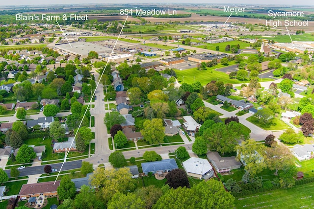 854 Meadow Ln, Sycamore, IL 60178 - aerial view of property and surrounding area with property boundaries highlighted and nearby suburban area