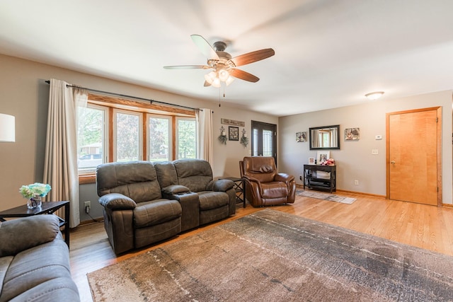 854 Meadow Ln, Sycamore, IL 60178 - living area with wood finished floors, a ceiling fan, and baseboards
