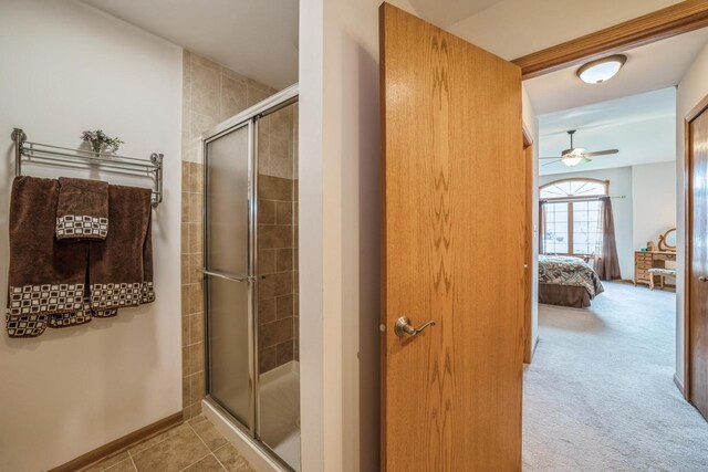 471 Linden Cir, Beecher, IL 60401 - ensuite bathroom featuring a stall shower, ceiling fan, and baseboards