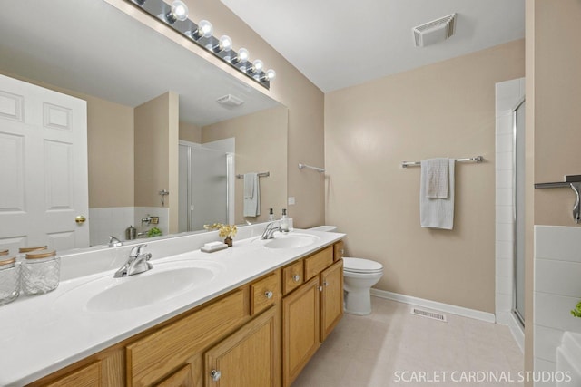 1653 W Ethans Glen Dr, Palatine, IL 60067 - full bathroom with a stall shower, double vanity, toilet, and baseboards