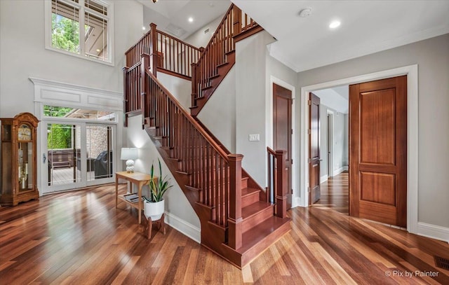 7N627 E Drive S, Elgin, IL 60177 - entrance foyer with wood finished floors, plenty of natural light, stairs, a high ceiling, and recessed lighting
