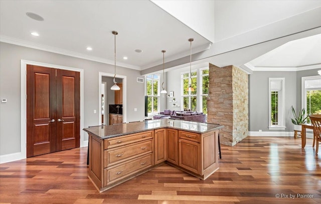7N627 E Drive S, Elgin, IL 60177 - kitchen with wood finished floors, hanging light fixtures, baseboards, open floor plan, and recessed lighting