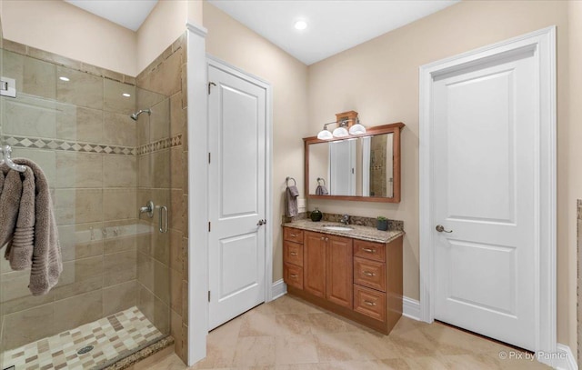 7N627 E Drive S, Elgin, IL 60177 - bathroom featuring a shower stall, vanity, and baseboards