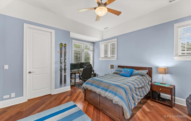 7N627 E Drive S, Elgin, IL 60177 - bedroom featuring wood finished floors, a desk, baseboards, and ceiling fan