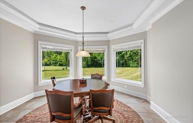 7N627 E Drive S, Elgin, IL 60177 - dining area featuring crown molding, baseboards, a raised ceiling, and light tile patterned floors