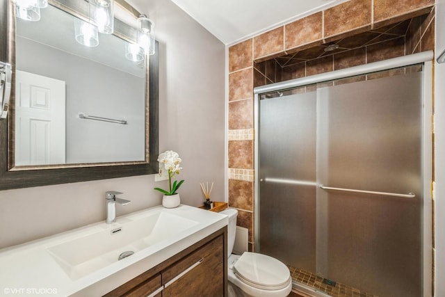1116 S New Wilke Rd Unit 107, Arlington Heights, IL 60005 - bathroom featuring a stall shower, toilet, and vanity