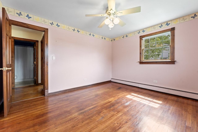 208 Ridge St, Algonquin, IL 60102 - unfurnished room featuring wood finished floors, a baseboard radiator, a ceiling fan, and baseboards