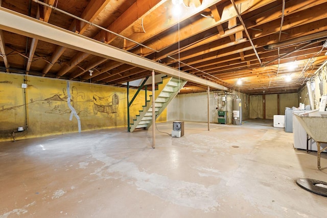 208 Ridge St, Algonquin, IL 60102 - unfinished below grade area with gas water heater, stairway, and separate washer and dryer