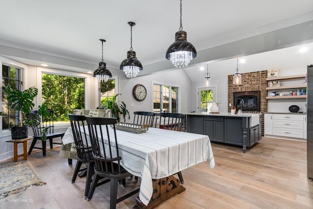 340 S Francis St, Braidwood, IL 60408 - dining space featuring light wood finished floors, ornamental molding, a chandelier, and recessed lighting