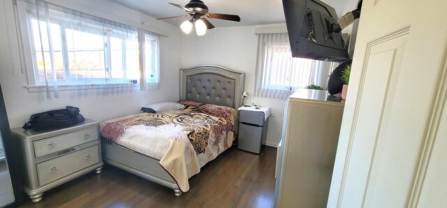 5644 Lyons St, Morton Grove, IL 60053 - bedroom featuring dark wood-style floors and ceiling fan