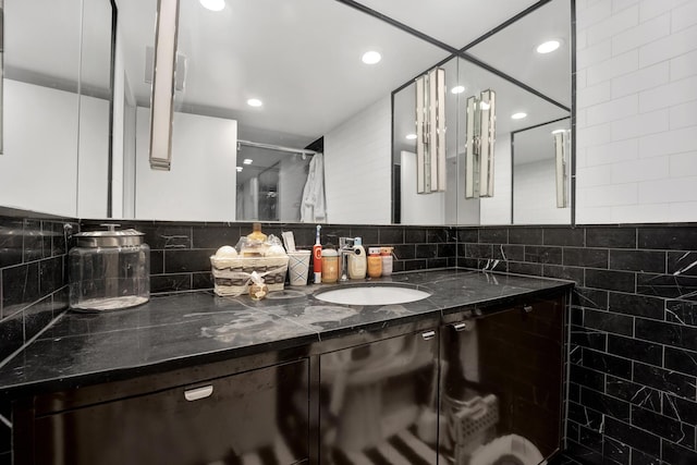 1440 N Lake Shore Dr Unit 4Bd, Chicago, IL 60610 - full bathroom with vanity, decorative backsplash, and recessed lighting