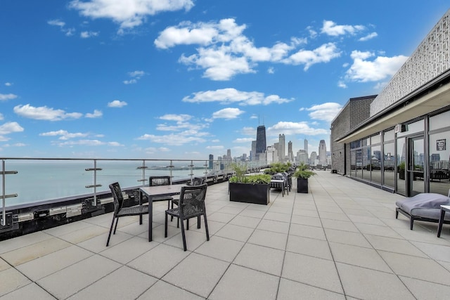 1440 N Lake Shore Dr Unit 4Bd, Chicago, IL 60610 - view of patio / terrace with a skyline view and a water view
