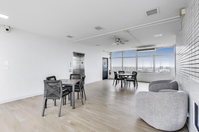 1440 N Lake Shore Dr Unit 4Bd, Chicago, IL 60610 - dining room with brick wall, wood finished floors, and a ceiling fan
