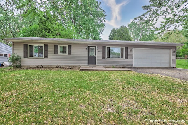 1708 Meadow Ln, Mchenry, IL 60050 - single story home with driveway, a garage, and a front yard