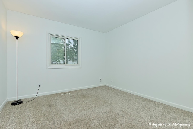 1708 Meadow Ln, Mchenry, IL 60050 - carpeted empty room featuring baseboards