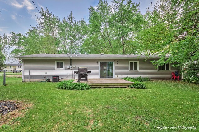 1708 Meadow Ln, Mchenry, IL 60050 - rear view of property featuring central AC and a wooden deck