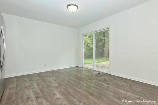 1708 Meadow Ln, Mchenry, IL 60050 - empty room with wood finished floors and baseboards