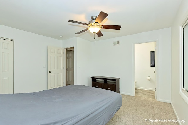 1708 Meadow Ln, Mchenry, IL 60050 - bedroom with light carpet, baseboards, ensuite bathroom, and ceiling fan