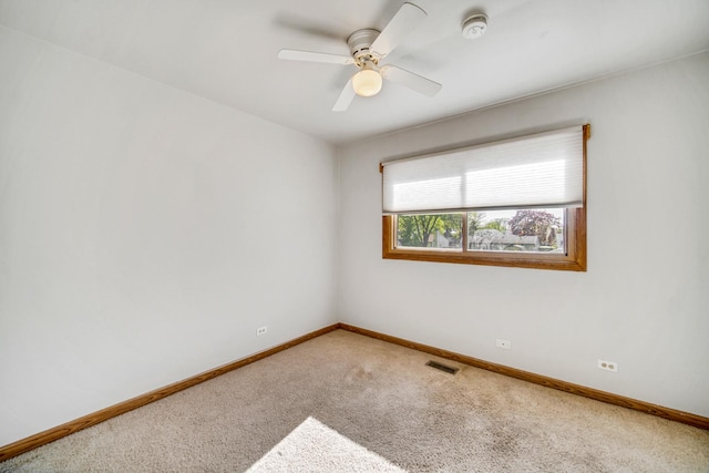 706 Shining Water Dr, Carol Stream, IL 60188 - carpeted empty room featuring baseboards, a ceiling fan, and a smoke detector
