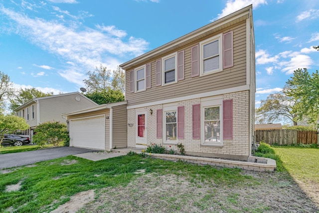 706 Shining Water Dr, Carol Stream, IL 60188 - colonial inspired home with brick siding, driveway, and an attached garage