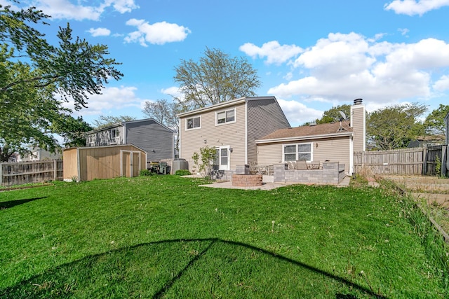 706 Shining Water Dr, Carol Stream, IL 60188 - back of house featuring a storage shed, a patio, a chimney, an outbuilding, and central AC unit