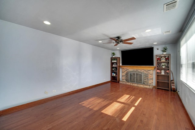 706 Shining Water Dr, Carol Stream, IL 60188 - unfurnished living room with baseboards, a brick fireplace, wood finished floors, ceiling fan, and recessed lighting