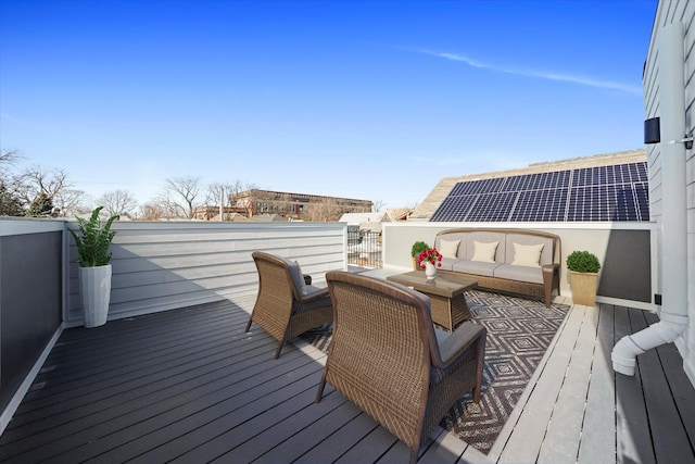 deck with an outdoor hangout area