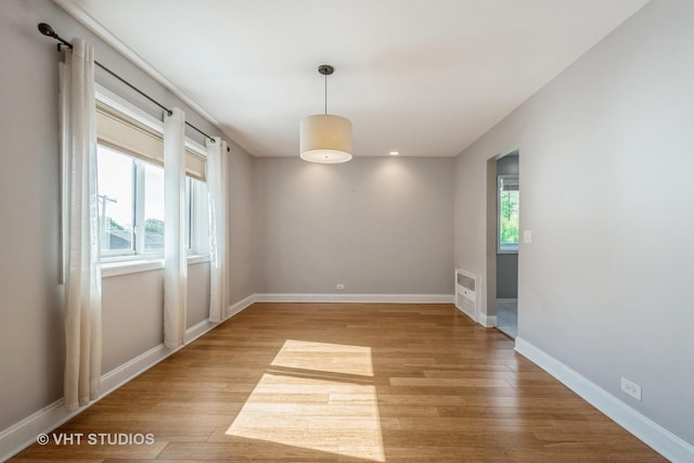 5251 W Galitz St Unit 309, Skokie, IL 60077 - empty room with light wood-style floors, baseboards, and recessed lighting