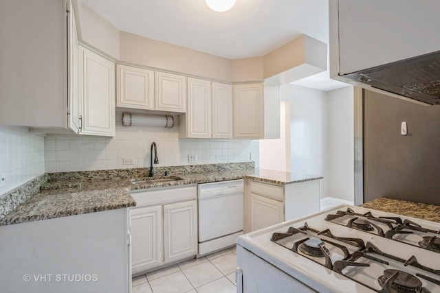 5251 W Galitz St Unit 309, Skokie, IL 60077 - kitchen with a sink, white appliances, tasteful backsplash, light stone countertops, and white cabinetry