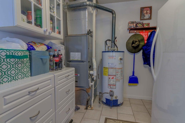 606 E Houghton St, Tuscola, IL 61953 - utility room with gas water heater