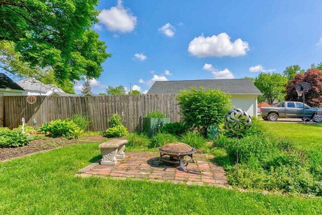 606 E Houghton St, Tuscola, IL 61953 - view of yard with an outdoor fire pit and a patio area