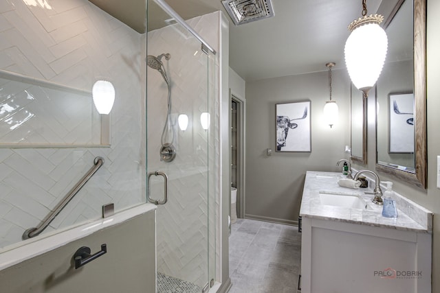5045 S Rd, Gurnee, IL 60031 - full bathroom with double vanity, a stall shower, and baseboards
