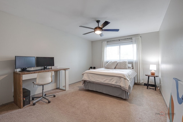 5045 S Rd, Gurnee, IL 60031 - bedroom with a desk, light colored carpet, ceiling fan, and baseboards