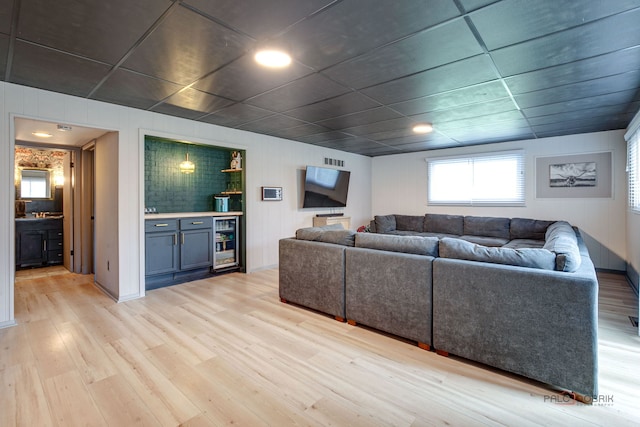 5045 S Rd, Gurnee, IL 60031 - living area featuring beverage cooler and light wood-type flooring