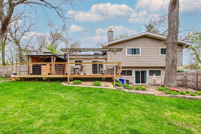 5045 S Rd, Gurnee, IL 60031 - rear view of property featuring a deck, brick siding, and a chimney