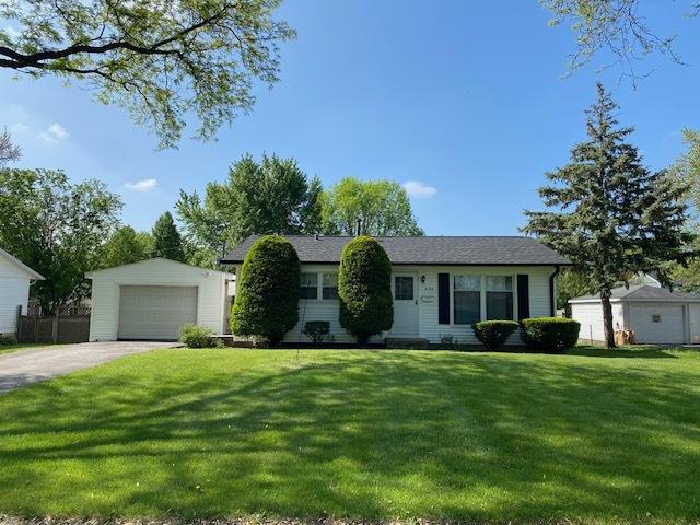 950 Arlon Rd, Aurora, IL 60506 - view of front of home with a front yard, a detached garage, and an outdoor structure