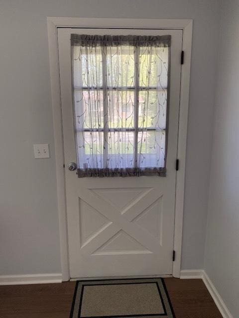 950 Arlon Rd, Aurora, IL 60506 - entryway featuring baseboards and dark wood-style flooring