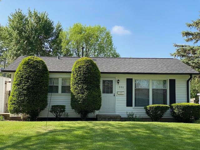 950 Arlon Rd, Aurora, IL 60506 - view of front facade featuring a front yard and a shingled roof