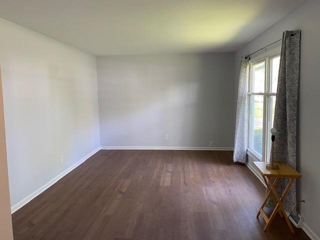 950 Arlon Rd, Aurora, IL 60506 - unfurnished room featuring dark wood-type flooring and baseboards