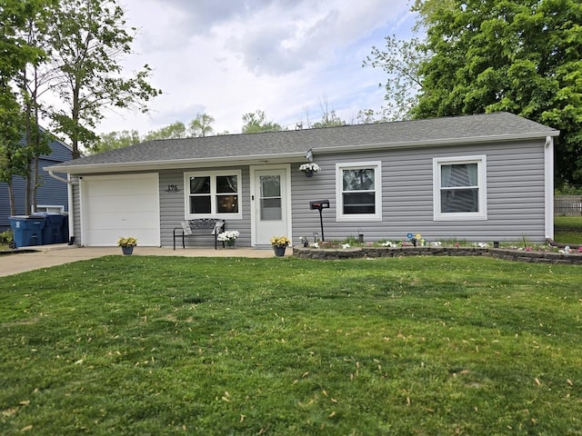 ranch-style house featuring concrete driveway, a front lawn, a garage, and roof with shingles