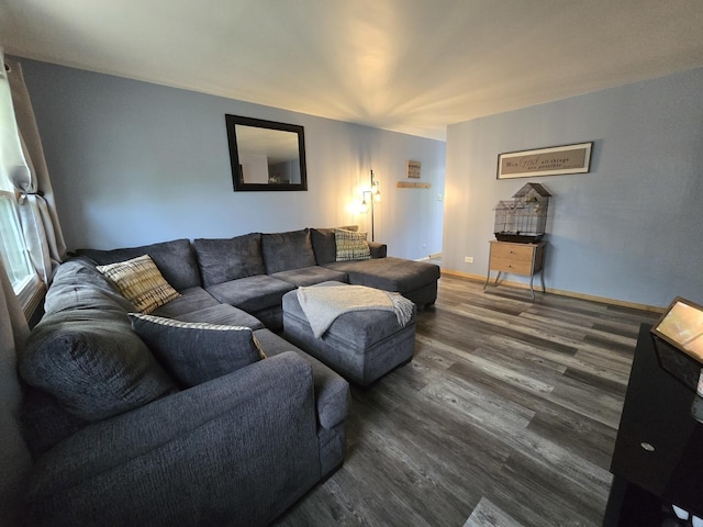 living area with dark wood-style floors and baseboards