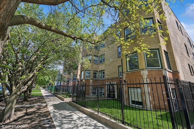 view of property with a fenced front yard