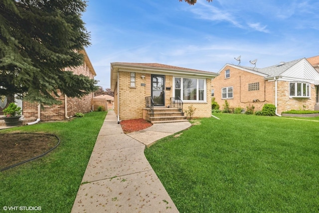 8128 N Odell Ave, Niles, IL 60714 - view of front of house with a front yard and brick siding