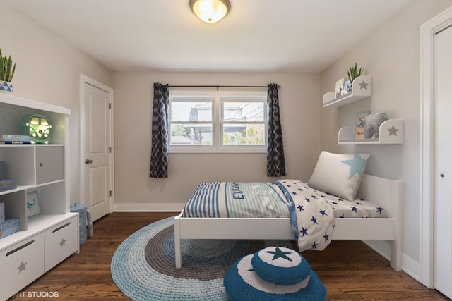 8128 N Odell Ave, Niles, IL 60714 - bedroom featuring dark wood-style flooring