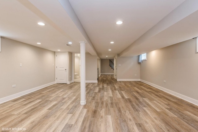 8128 N Odell Ave, Niles, IL 60714 - basement featuring stairway, recessed lighting, baseboards, and light wood-type flooring