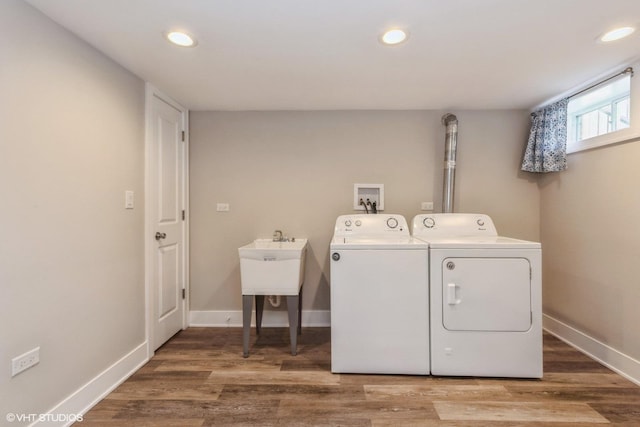 8128 N Odell Ave, Niles, IL 60714 - laundry room featuring separate washer and dryer, recessed lighting, baseboards, and wood finished floors
