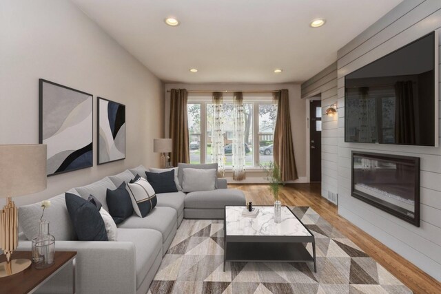 8128 N Odell Ave, Niles, IL 60714 - living area featuring wood finished floors, recessed lighting, and a fireplace